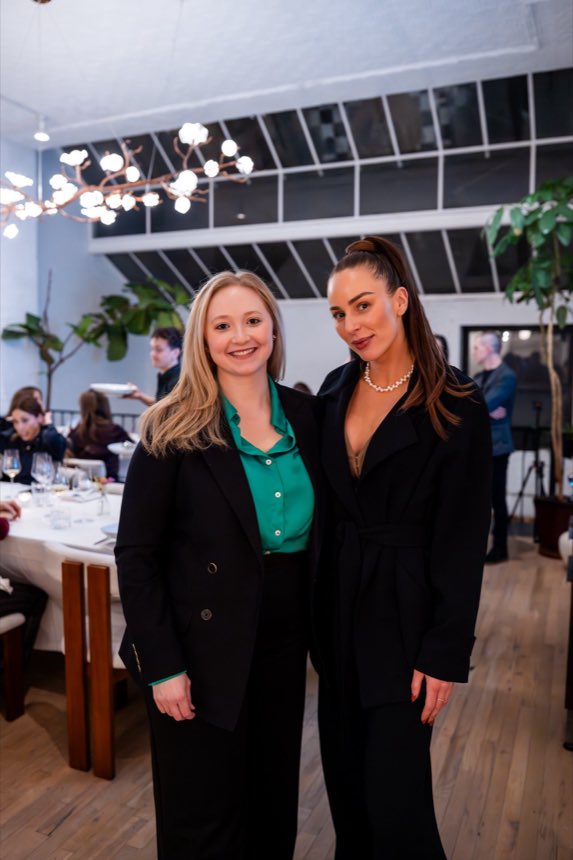 Two founders together at a Time Rich investor dinner