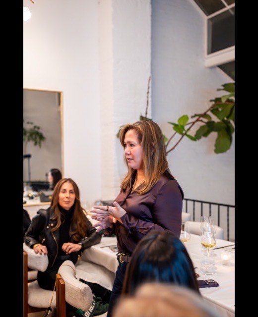 A founder sharing her story at the Time Rich investor dinner
