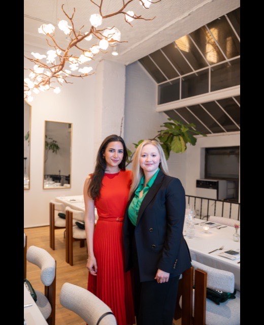 A guest arriving at the Time Rich investor dinner