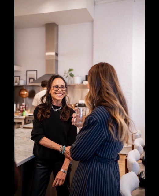 Guests connecting over drinks at the Time Rich investor dinner